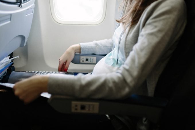 Pregnant woman traveling by plane. Air travel. Is it save to travel during pregnancy?