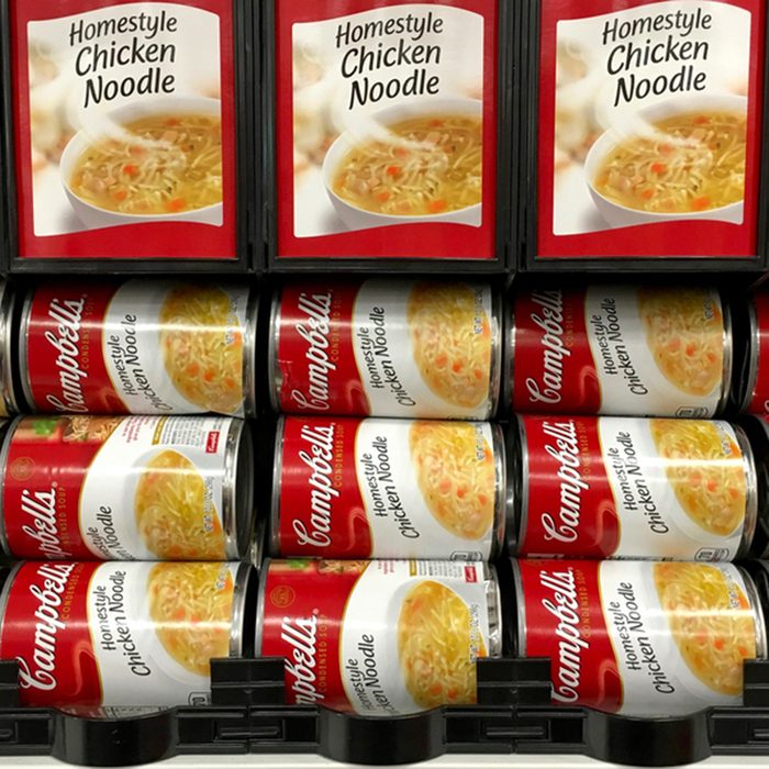 Campbell's soup on store shelf.