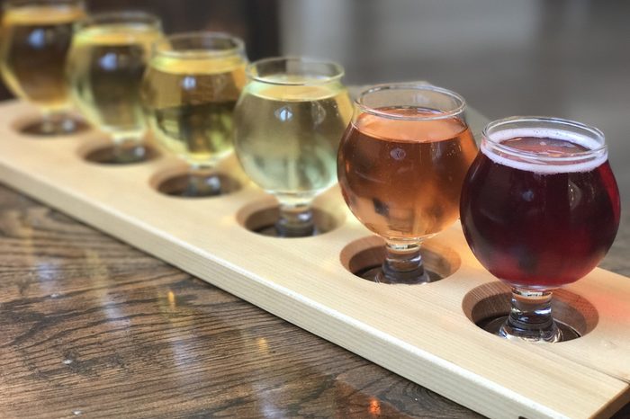 Cider tasting flight on a wood board