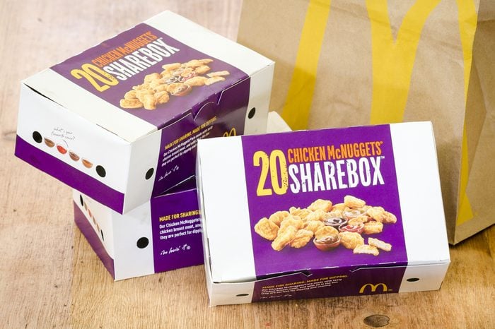 London, England - April 25, 2014: Box of McDonald's Chicken McNuggets, McDonald's is a fast food restaurant chain founded in 1940.
