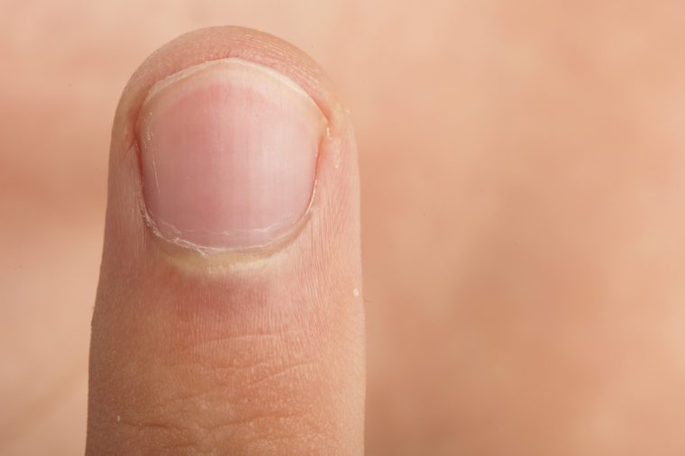 extreme closeup of a male finger detail