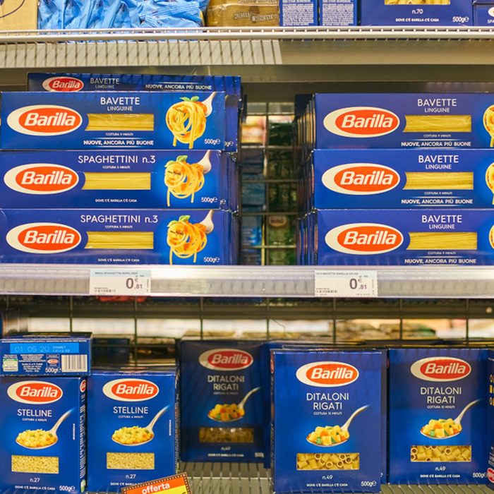 assortment of pasta on display for sale at Carrefour Express in Milan.