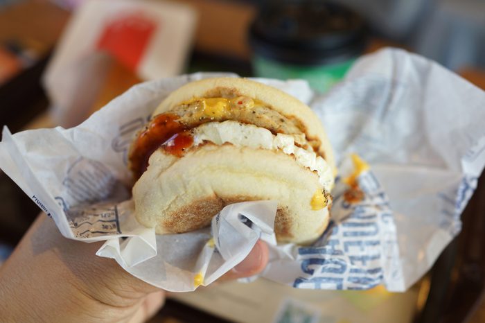 PENANG, MALAYSIA - MAY 25, 2018 : Egg McMuffin with McDonald Premium Roast Coffee is one of the meals choice at McDonald's Weekday Breakfast Specials.