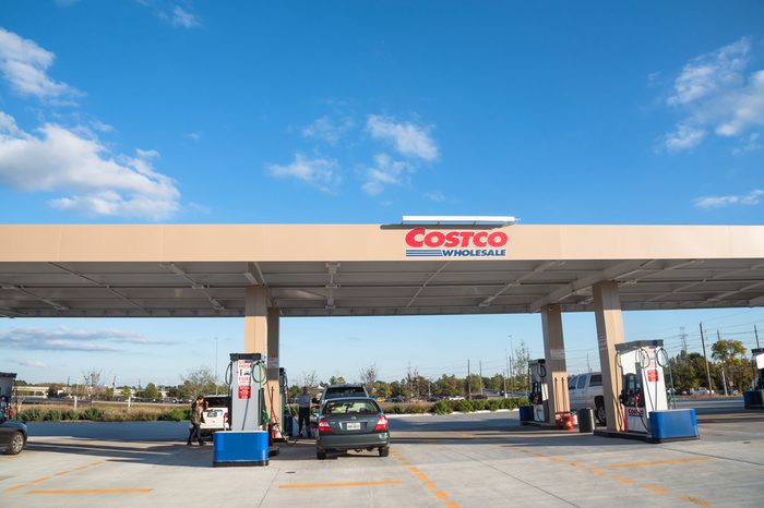 HUMBLE, TEXAS, US-NOV 23, 2016: Costco gas station with customers refueling. Costco Wholesale Corporation is largest membership-only warehouse club in US. It has a total of 705 warehouses worldwide.