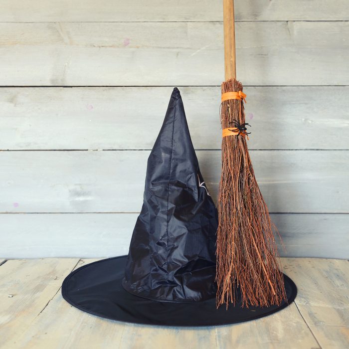 Halloween photo with witch hat and broom