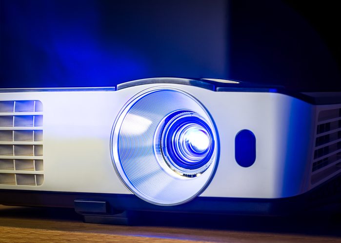Closeup of projector for presentation in blue light tone