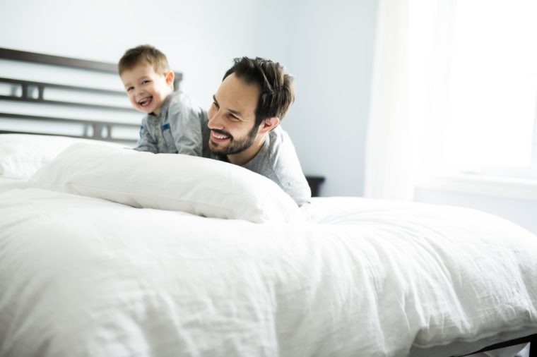 A Father and son in bed, happy time on bed