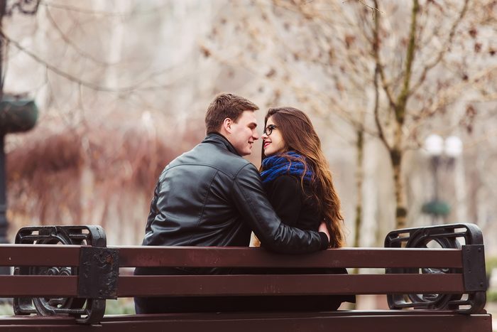 couple in love on a bench. Romantic ideas for her