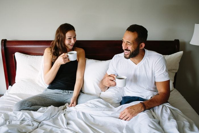 couple drinking coffee in bed. Romantic ideas for her