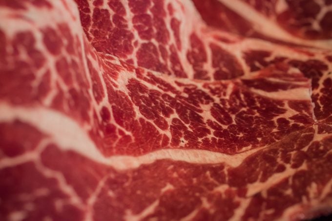 Marbling Japanese beef, raw beef, fresh meat. Wagyu beef macro. Beef wagyu with marbling texture.