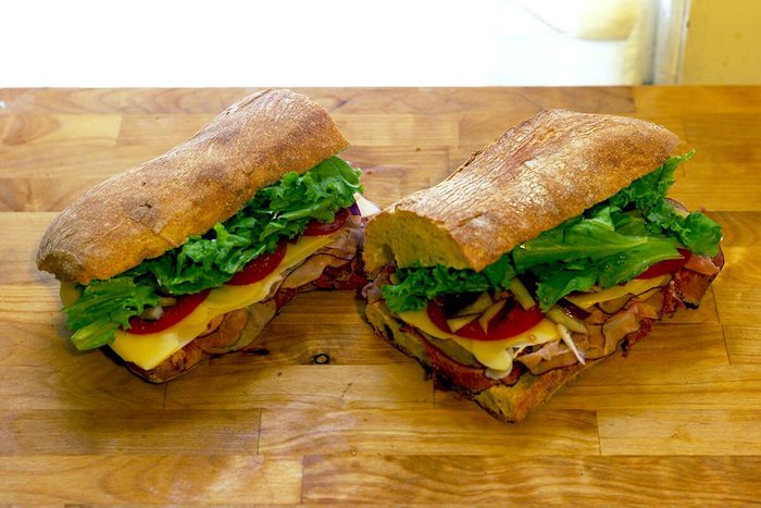 Cut in half sandwich on a cutting board