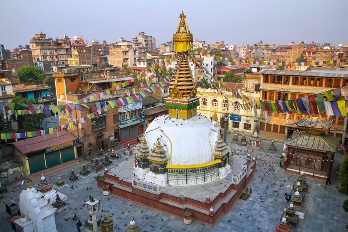 Kathesimbu Stupa with Buddha wisdom eyes and prayer colorful flags in Kathmandu, Nepal