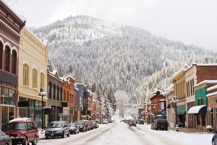 Horizontal Photo of Winter in Downtown Wallace Idaho with snow and mountain in background
