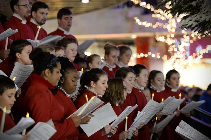 BRISTOL - NOV 7: Bristol Cathedral Choir peform in Cabot Circus shopping mall on Nov 7, 2014 in Bristol, UK. The choir performed traditional Christmas carols for visitors to the mall.