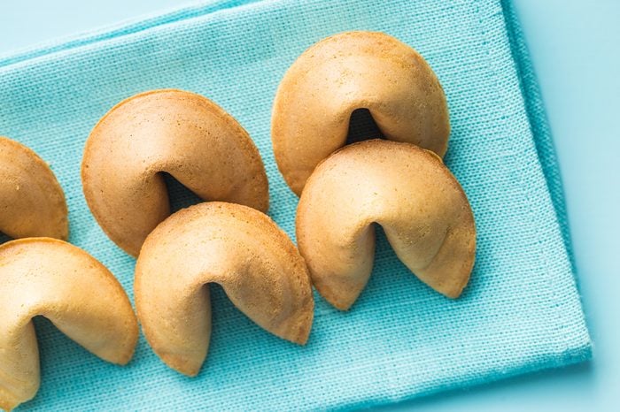 The fortune cookies on blue napkin.