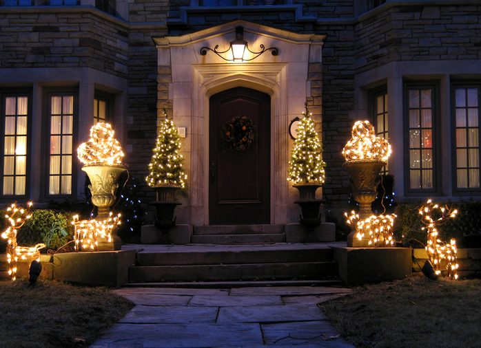front door with holiday lights