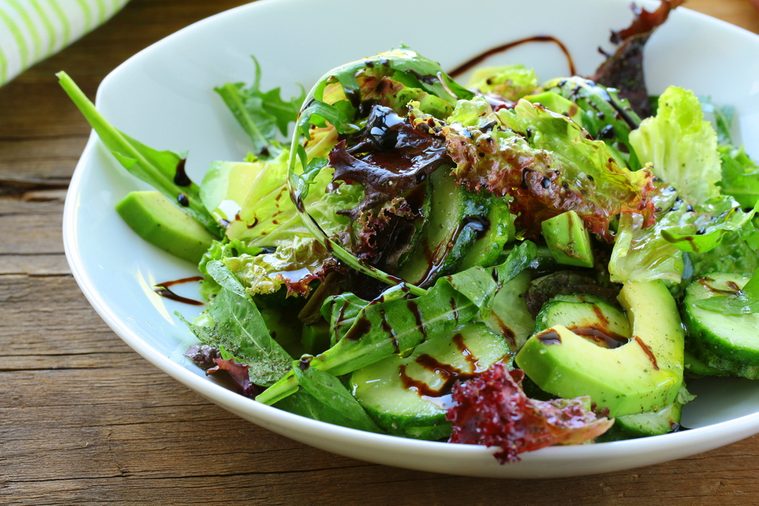 salad mix with avocado and cucumber, with balsamic dressing