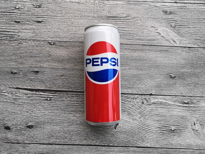 Shah Alam, Malaysia - 13 October 2018 : View a PEPSI Limited Edition Retro can year 1980s on the wooden background.Pepsi carbonated soft drink is produced and manufactured by PepsiCo.