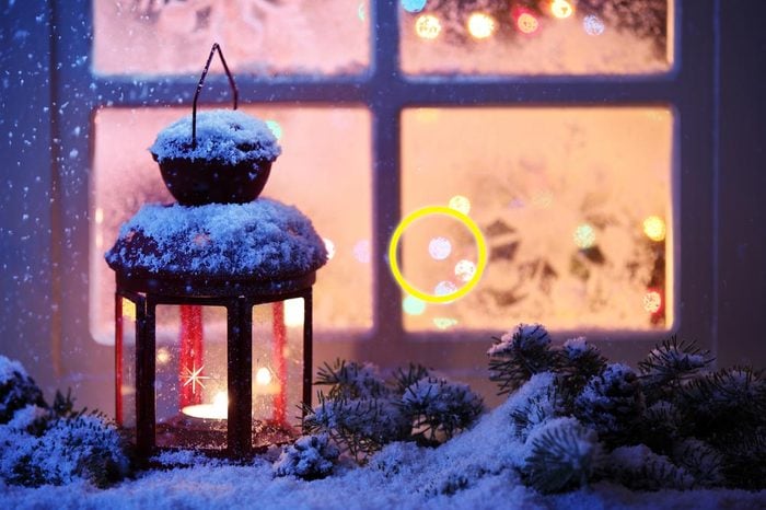Christmas lantern with snowfall,Closeup.