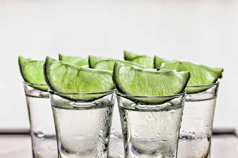 Cocktail. Vodka, gin, tequila with lime