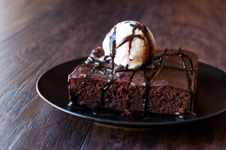 Chocolate Brownie with Ice Cream and Hazelnut Powder.