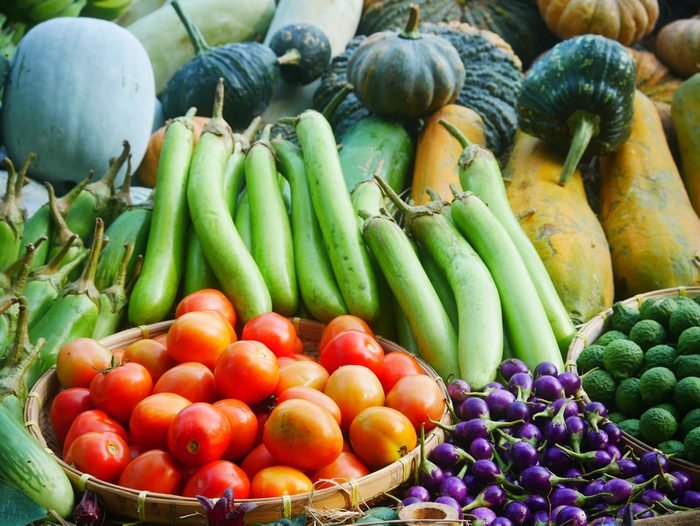 Fresh and colorful tropical vegetables and fruits from organic garden.
