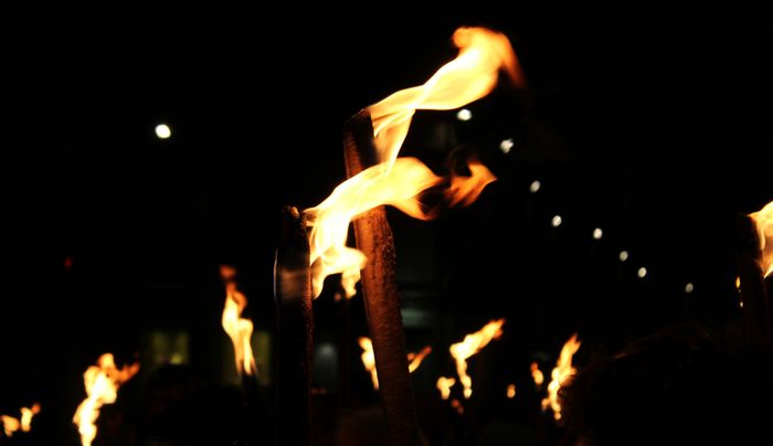 Torches at night in a procession