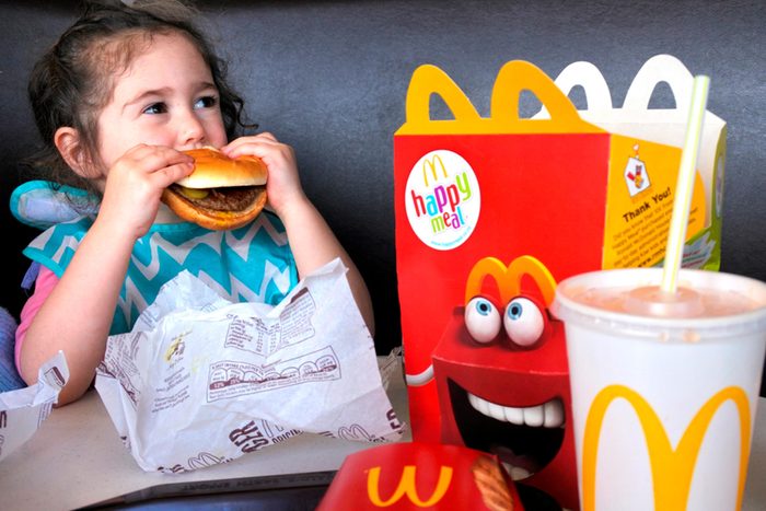 Child eating fast food