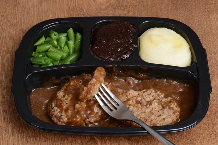salisbury steak tv dinner with a fork