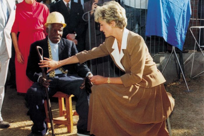 Diana Princess Of Wales At An Old People's Home In Zimbabwe. It Has Been Called The Suffering Tour And These Past Few Days Princess Diana Has Been Seen Comforting The Desperately Sick Hugging A Woman Dying From Aids Stretching Out Loving Arms To Tho
