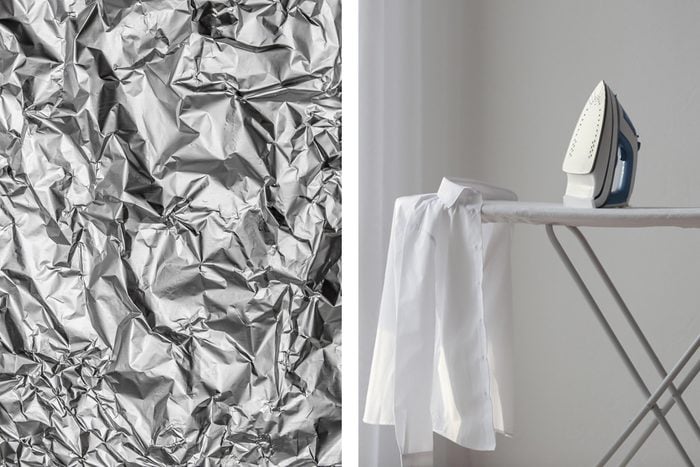 Aluminum foil texture next to ironing board, shirt, and iron