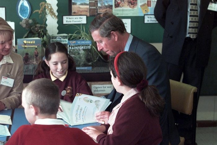 Prince Charles Reading His Book 'the Old Man Of Lochnagar' Which He Found On A School Desk At St Marks Primary School Brighton.pic Mike Forster