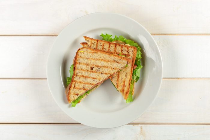 Club sandwich on wooden table