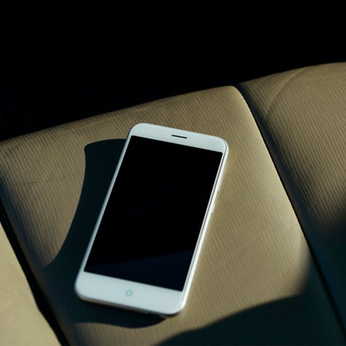 cell phone on seat of car