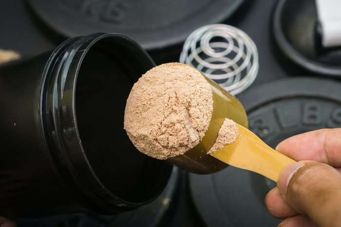 low key scoop up whey protein, selective focus