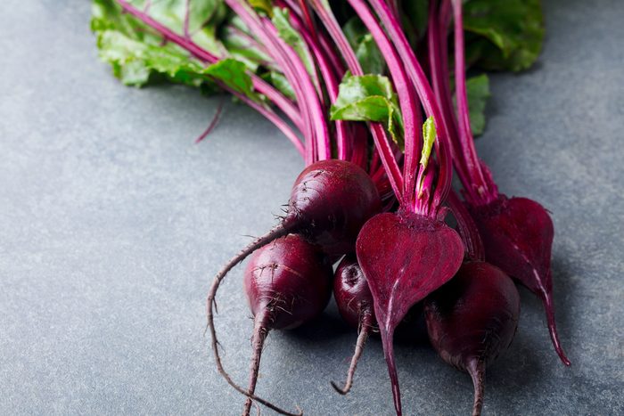 Fresh organic beet, beetroot. Grey background. Copy space. Top view.