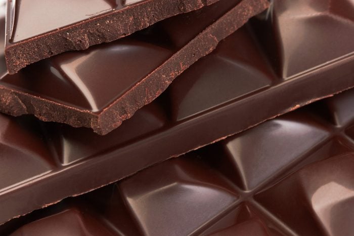 Stack of chocolate pieces, close up