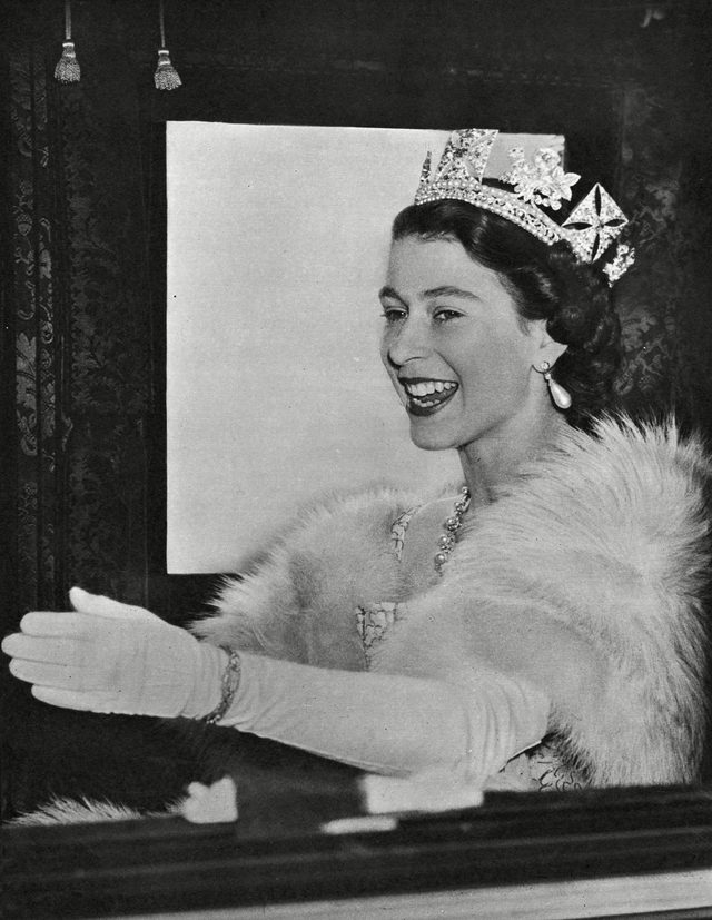 Historical Collection 174 Queen Elizabeth Ii Wearing A Fur Stole and the George Iv State Diadem Waves to Crowds From Her Coach On the Way to Westminster For the State Opening of Parliament 1952
