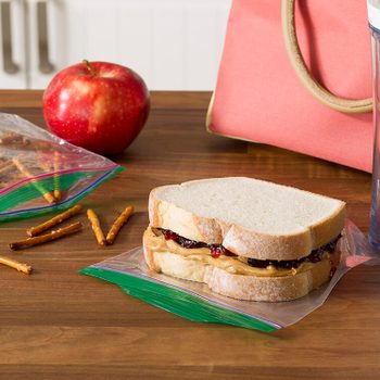 pretzels and pb&j sandwich sitting on zip-top bags