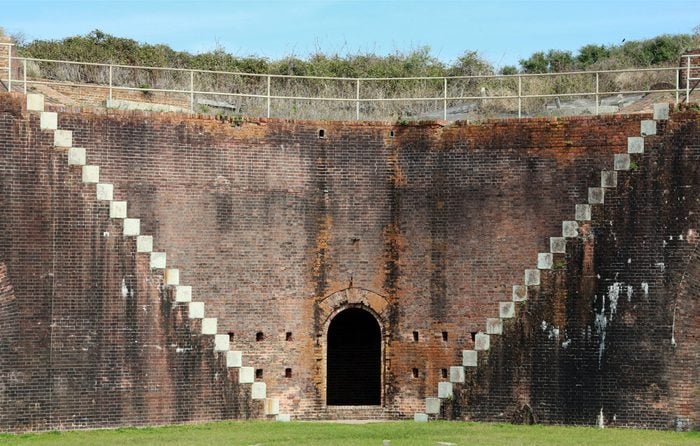 Steps on brick wall of 1834 Fort Morgan form a v-shape, Mobile Point, Alabama, USA