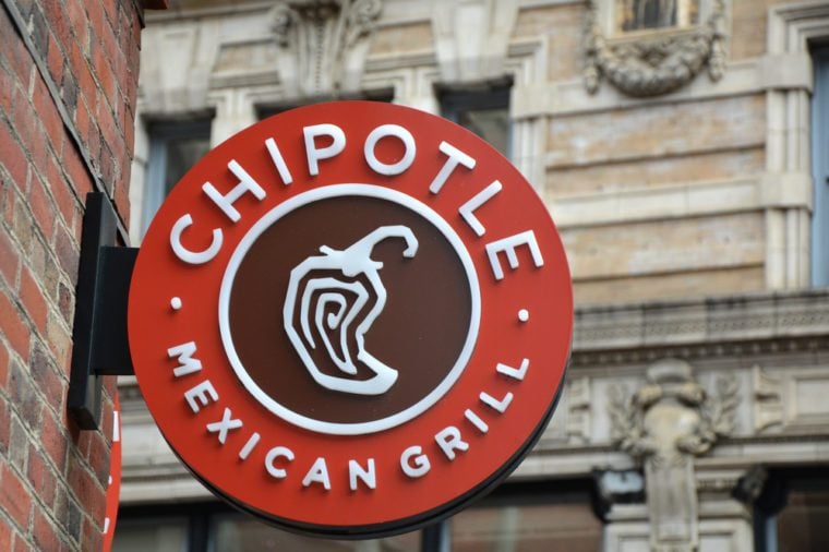 BOSTON, USA - OCTOBER 21, 2014 : Chipotle Mexican Grill signboard on the wall in Boston. Chipotle is a chain of American restaurants serving mexican food
