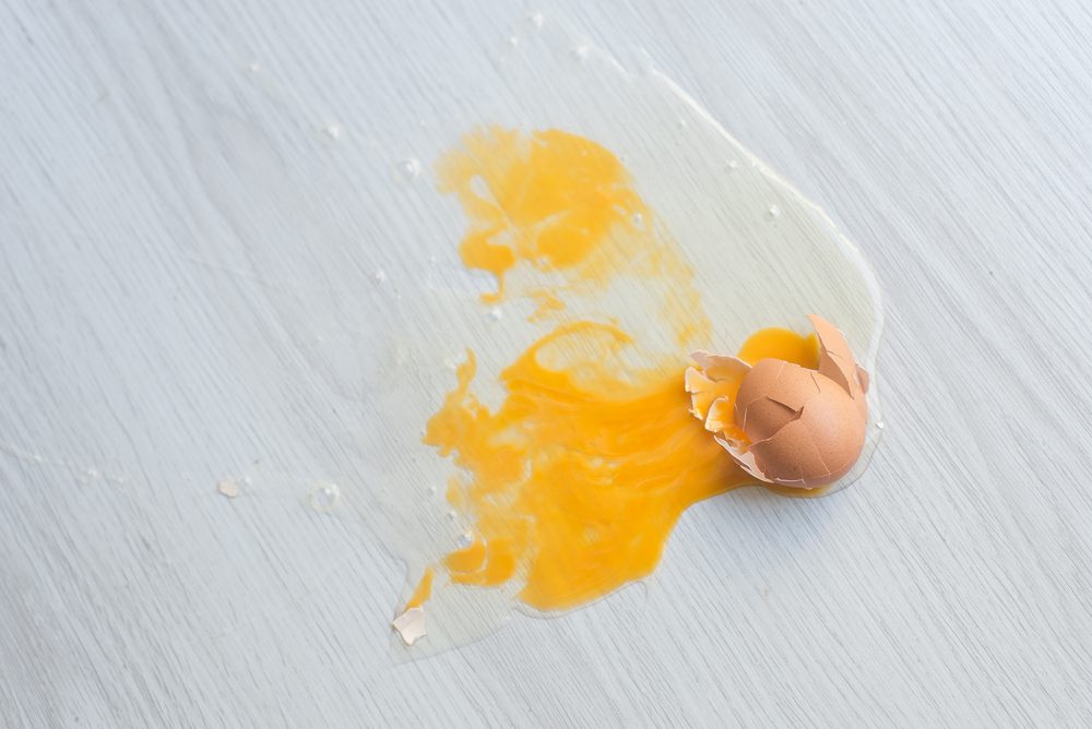 https://www.rd.com/wp-content/uploads/2019/01/broken-egg-on-floor.jpg?fit=700%2C468