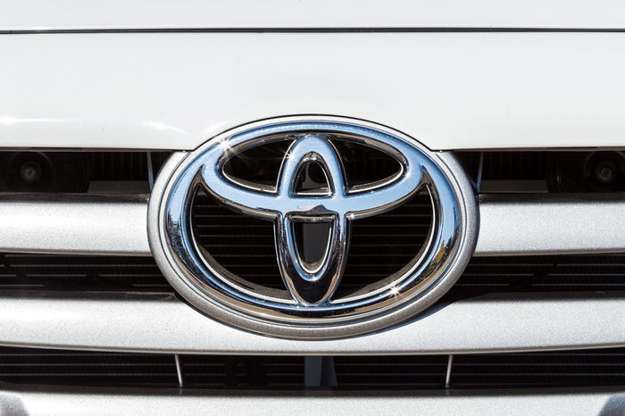 CHIANGRAI, THAILAND - DECEMBER 31, 2014 : Logo of Toyota car on display at Chiang Rai ASEAN flower festival 2014