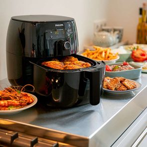 black philips air fryer with food inside