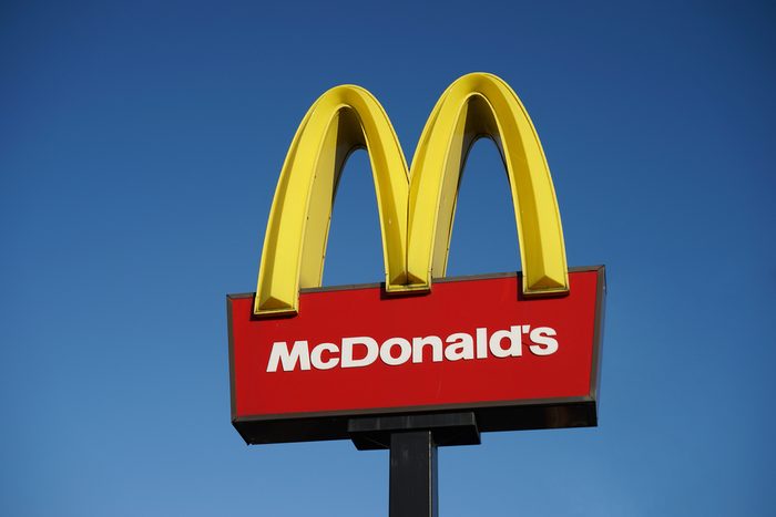 LONDON - DEC 13: McDonalds logo on blue sky background on Dec 13, 2014, London, UK. It is the world's largest fast food chain, over 31,000 restaurants worldwide, serve 58 million customers each day.