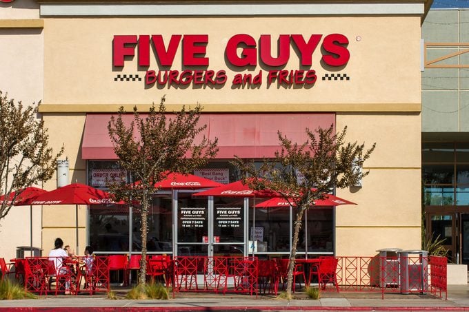 LOS ANGELES, CA/USA - OCTOBER 13, 2014: Five Guys Burgers and Fries restaurant exterior. Five Guys is a restaurant chain that serves on hamburgers, hot dogs, and French fries.