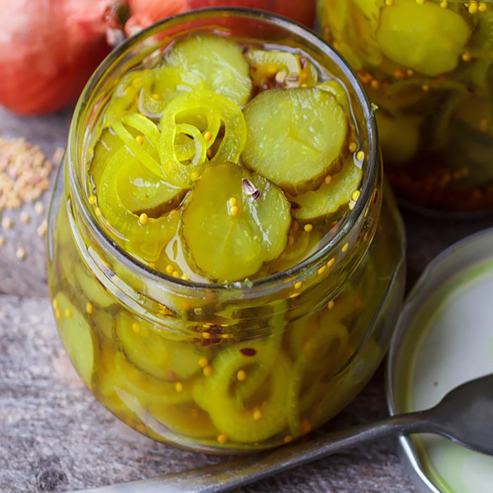 Pickled Cucumbers . Sliced cucumbers marinated with onions and mustard;