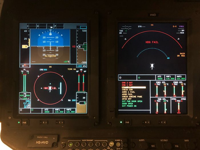 transport class helicopter flight instrument with red heading flag or an aircraft instrument dashboard screen with a red heading fail flag. Glass cockpit flight instrumentation of Thales Topdeck.