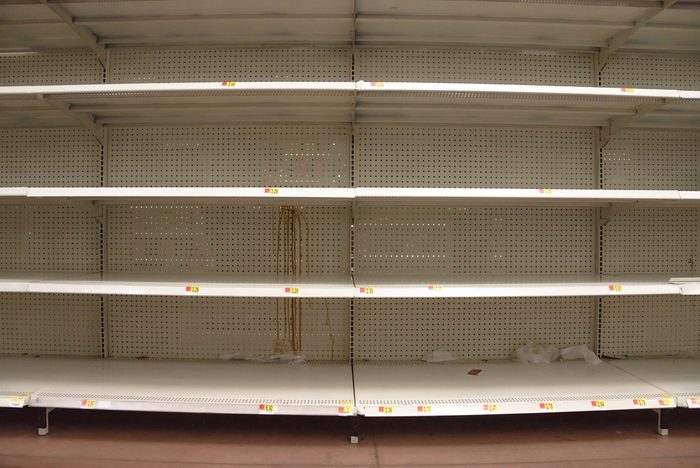 Empty shelves in store in Humble, Texas USA. Supermarket with empty shelves for goods.