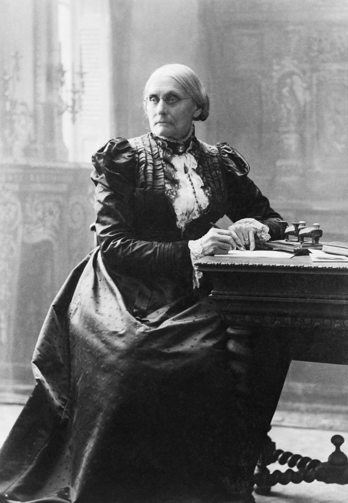 Suffragist Susan B. Anthony (1820-1906), seated at her desk.